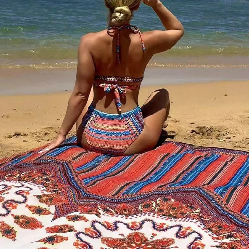 Women's three-piece swimsuit set showing high-waist briefs, sleeveless cutout top, and matching swim coat.