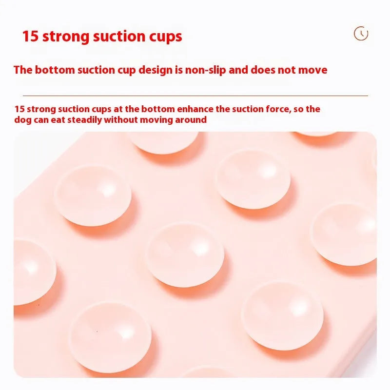 Silicone pet licking mat with textured surface and suction cup base in pink colour