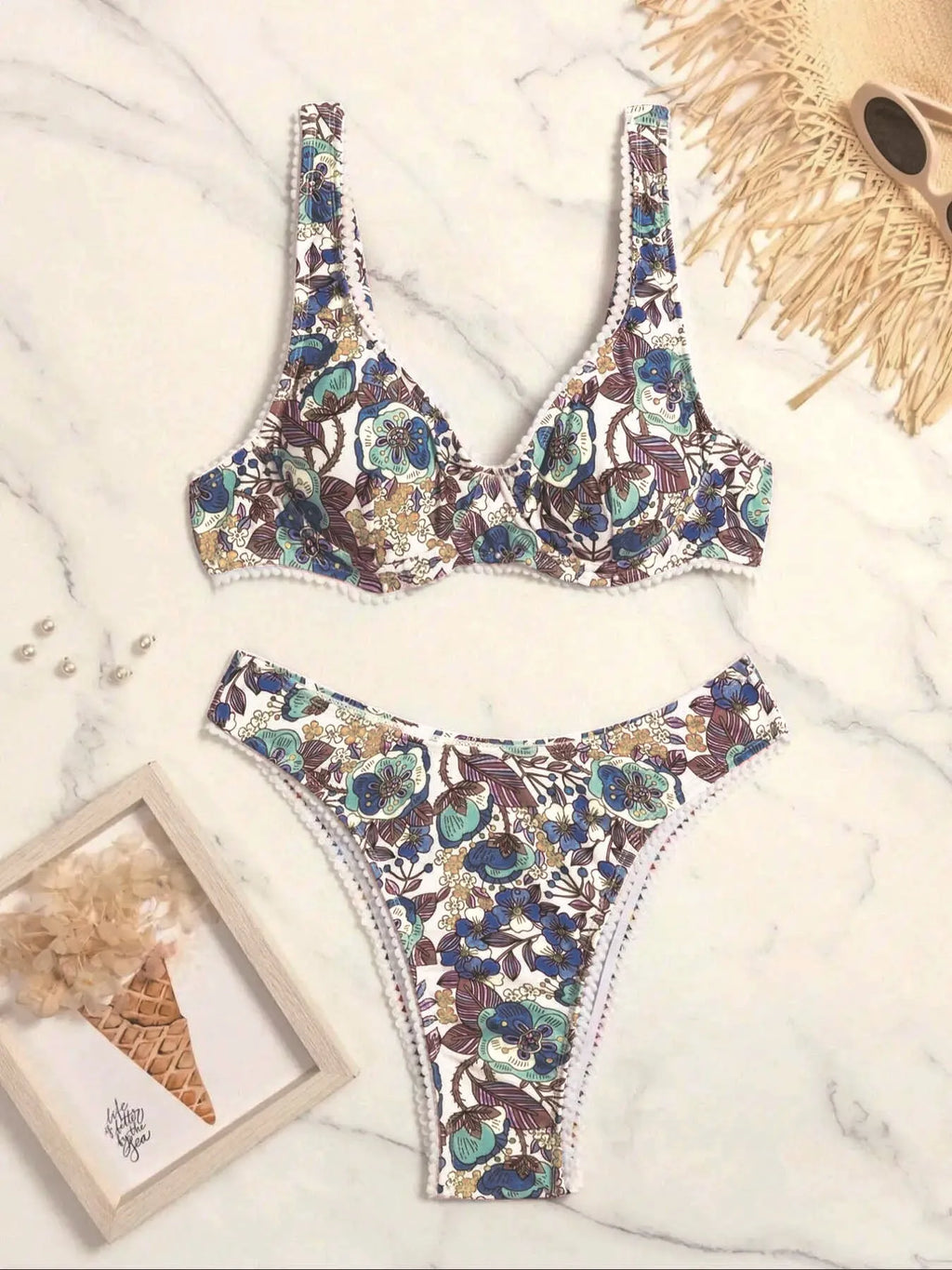 Women's floral print bikini with underwire bra and high-waisted briefs with side ties