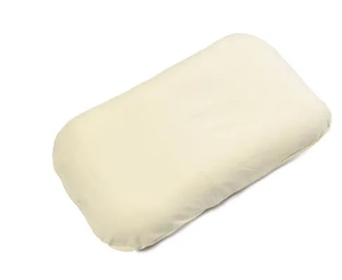 Cotton portable baby nest crib for newborns, beige colour, shown on a bed.