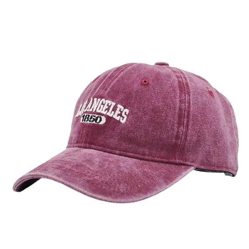 Retro personalised peaked cap with letters embroidery in beige, adjustable strap visible.