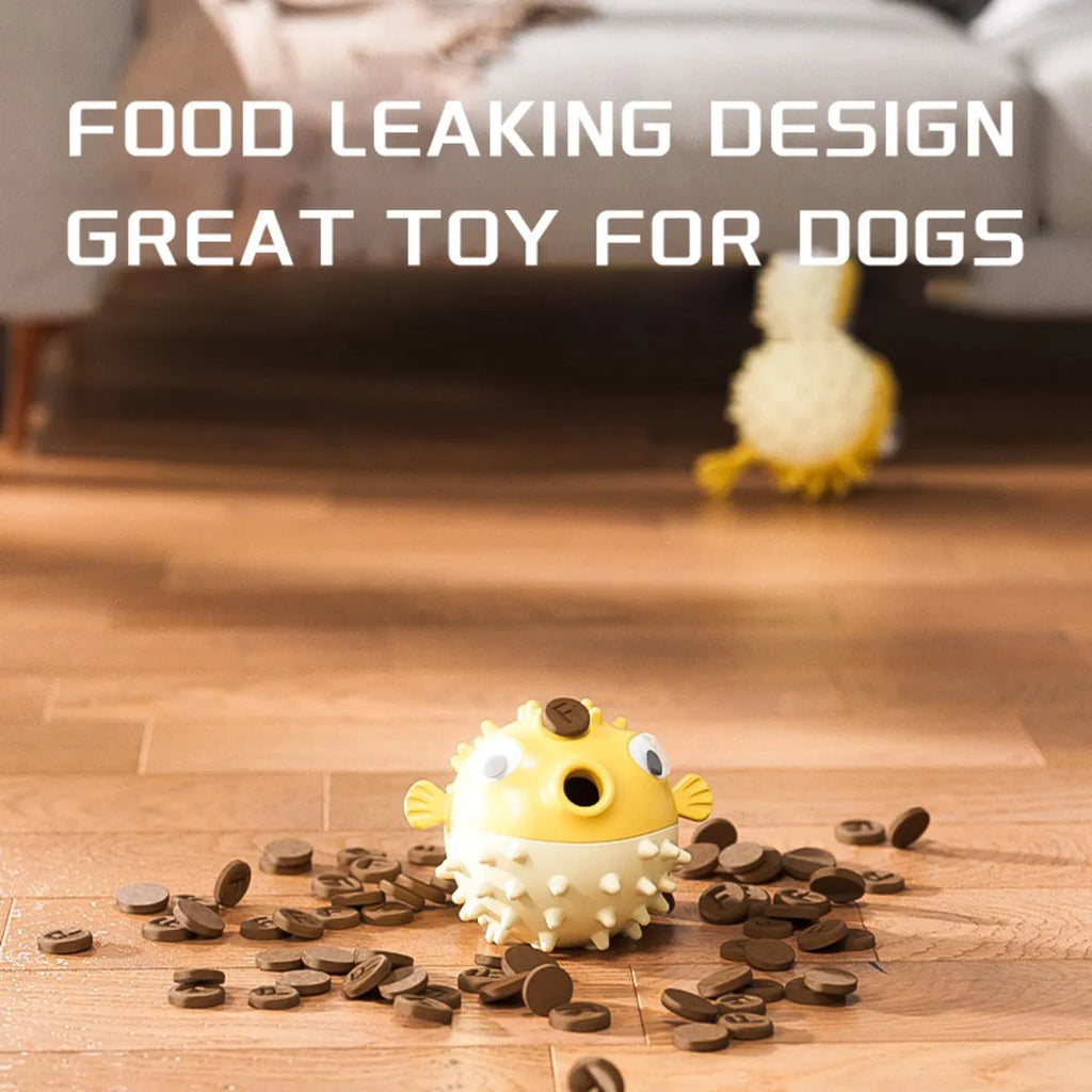 Yellow fish-shaped dog chew toy with textured surface and squeaker for aggressive chewers