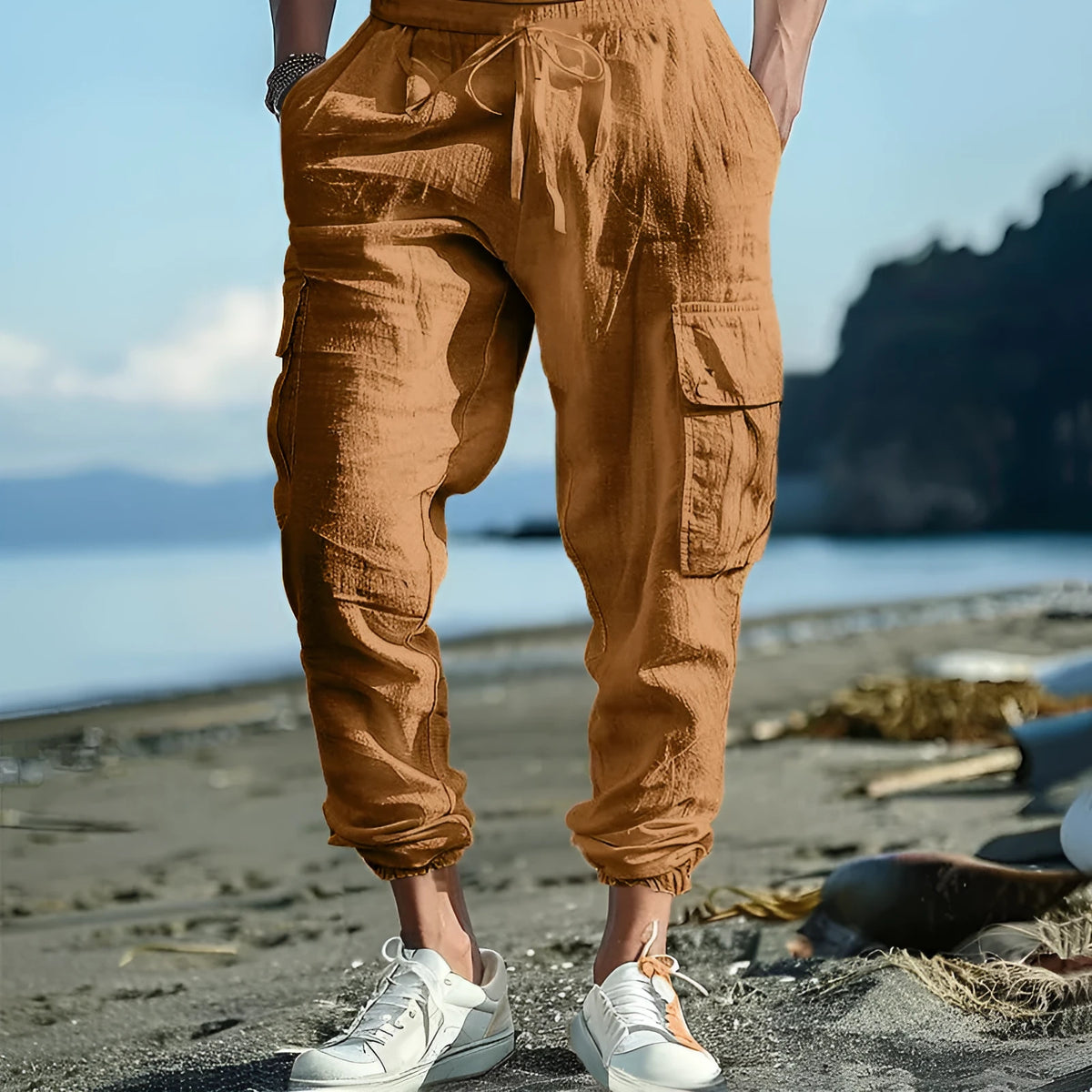 Men's casual linen trousers in solid colour with ankle ties and multiple pockets, loose fit, drawstring waist.