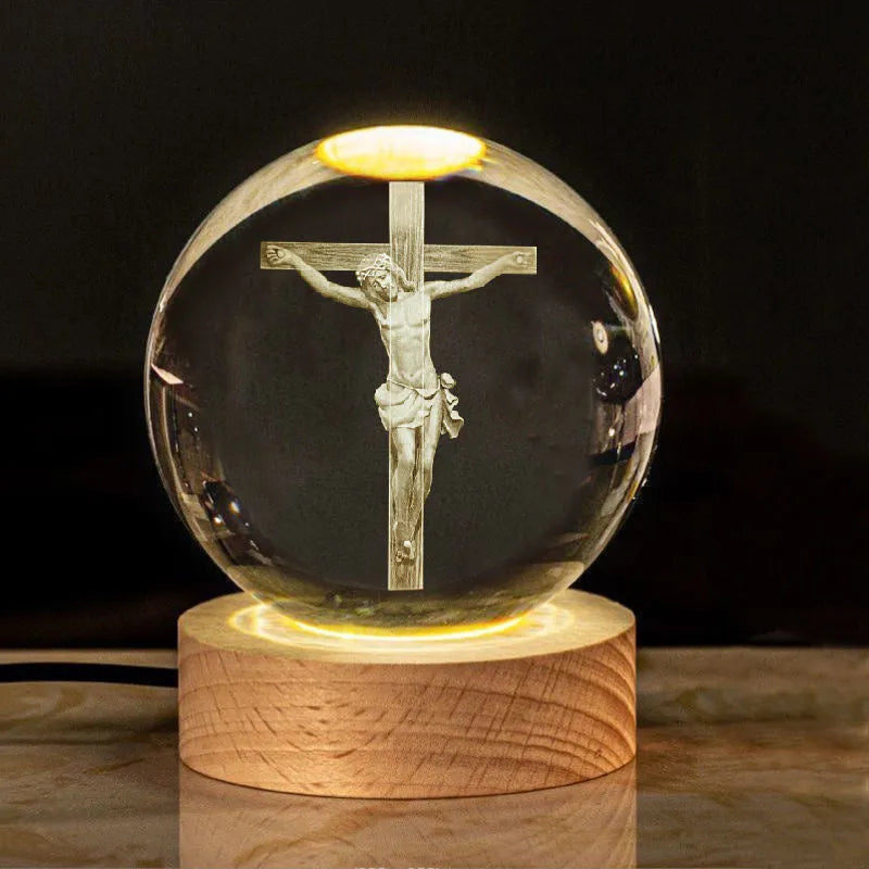 White crystal ball desk ornament with wood base and religious design inside
