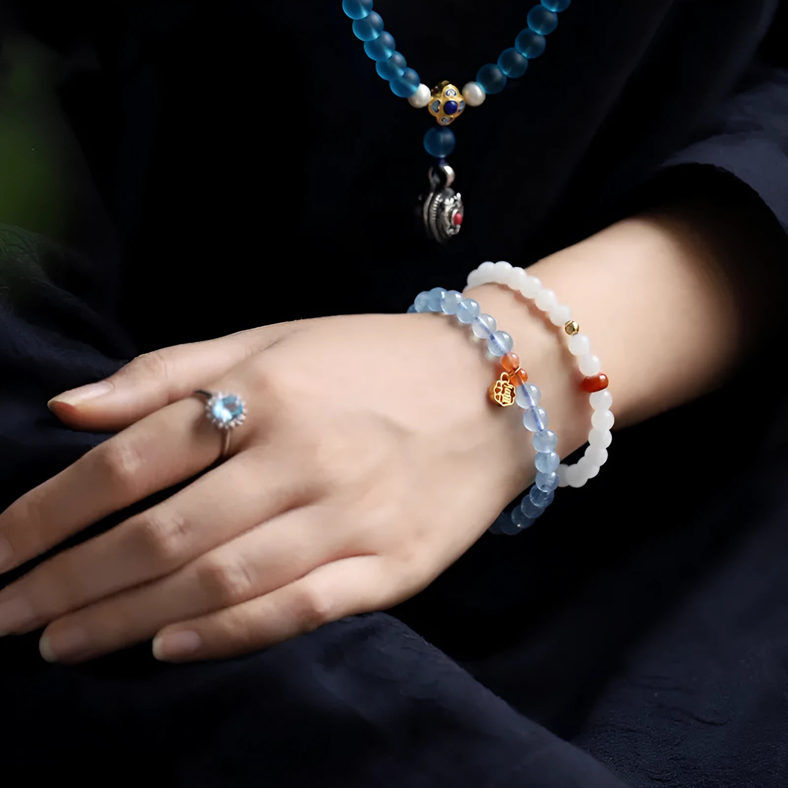 Women's ice translucent aquamarine crystal bracelet with 8mm round beads and blessing card detail