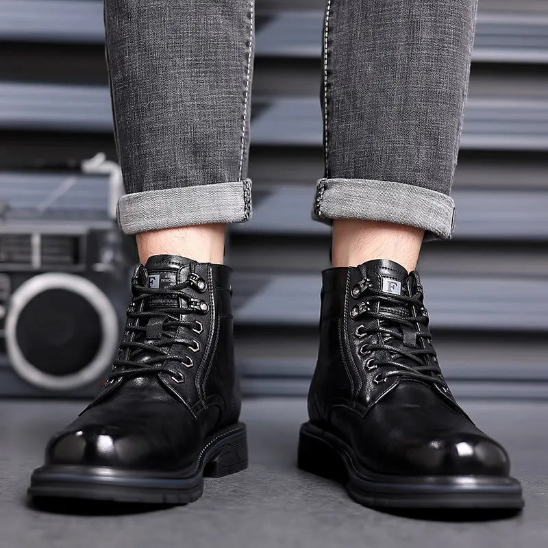 Low heel leather ankle boots with square heel and patent leather construction in black colour