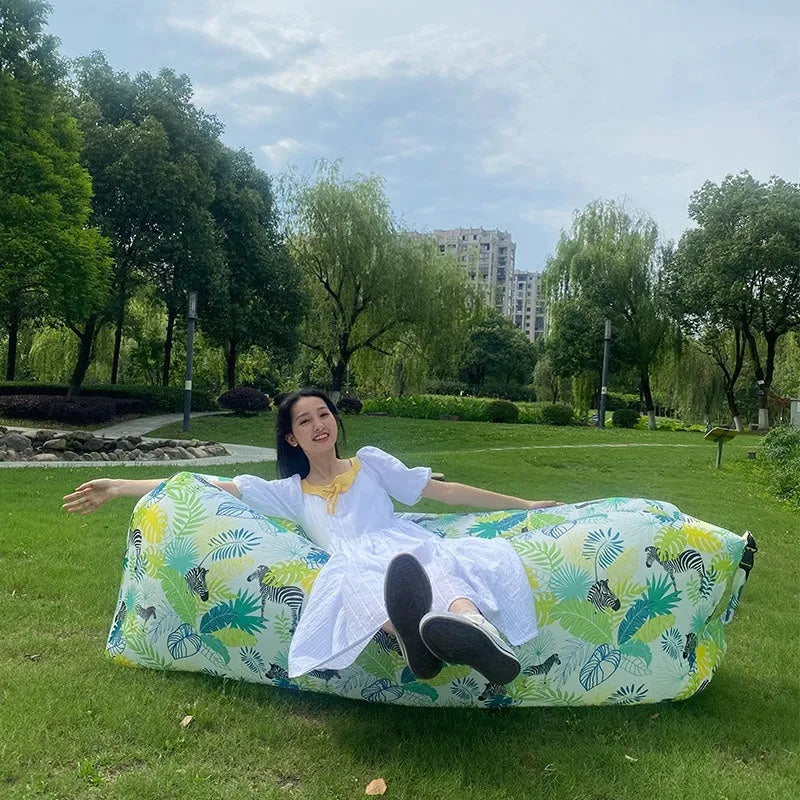Inflatable lazy sofa in outdoor setting with colourful design options