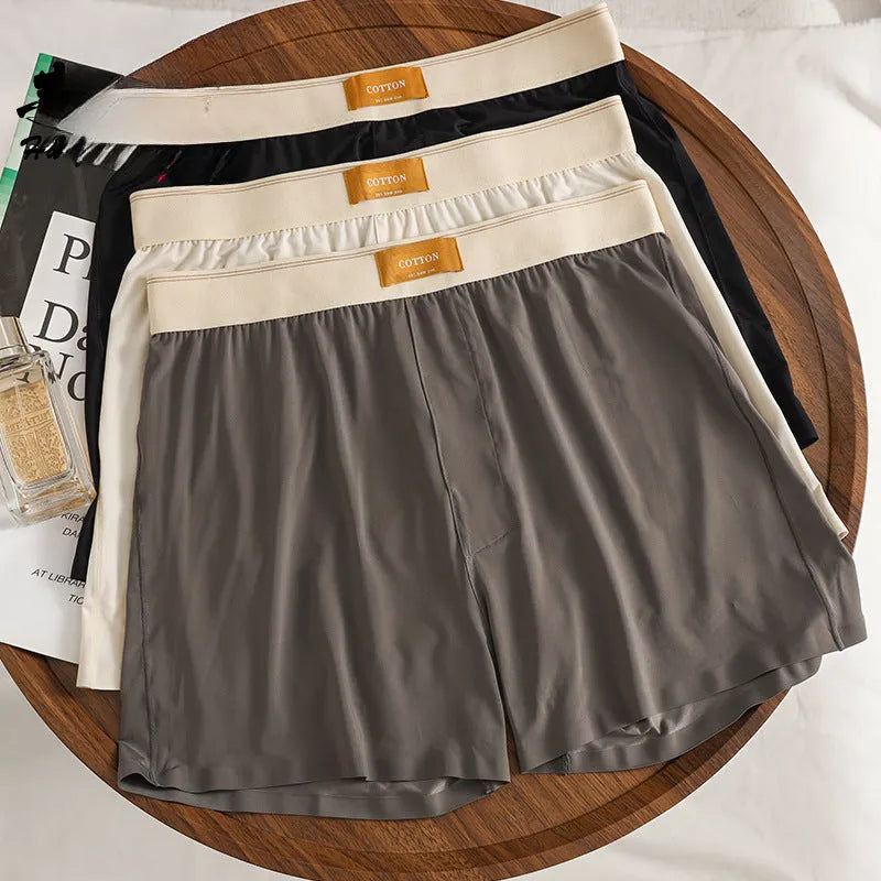 Men's ice silk underwear in solid colours showing loose fit and mid waist design