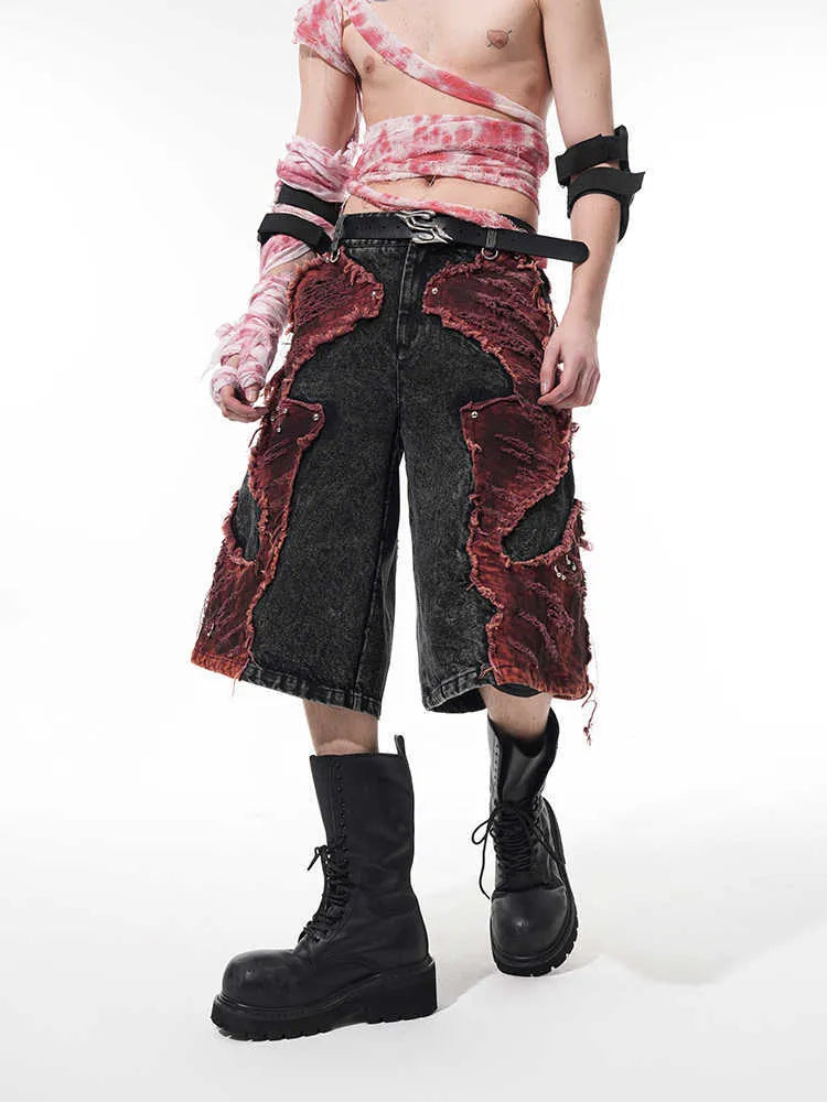 Distressed denim cropped pants with wide-leg cut and mid-high waist in cotton fabric