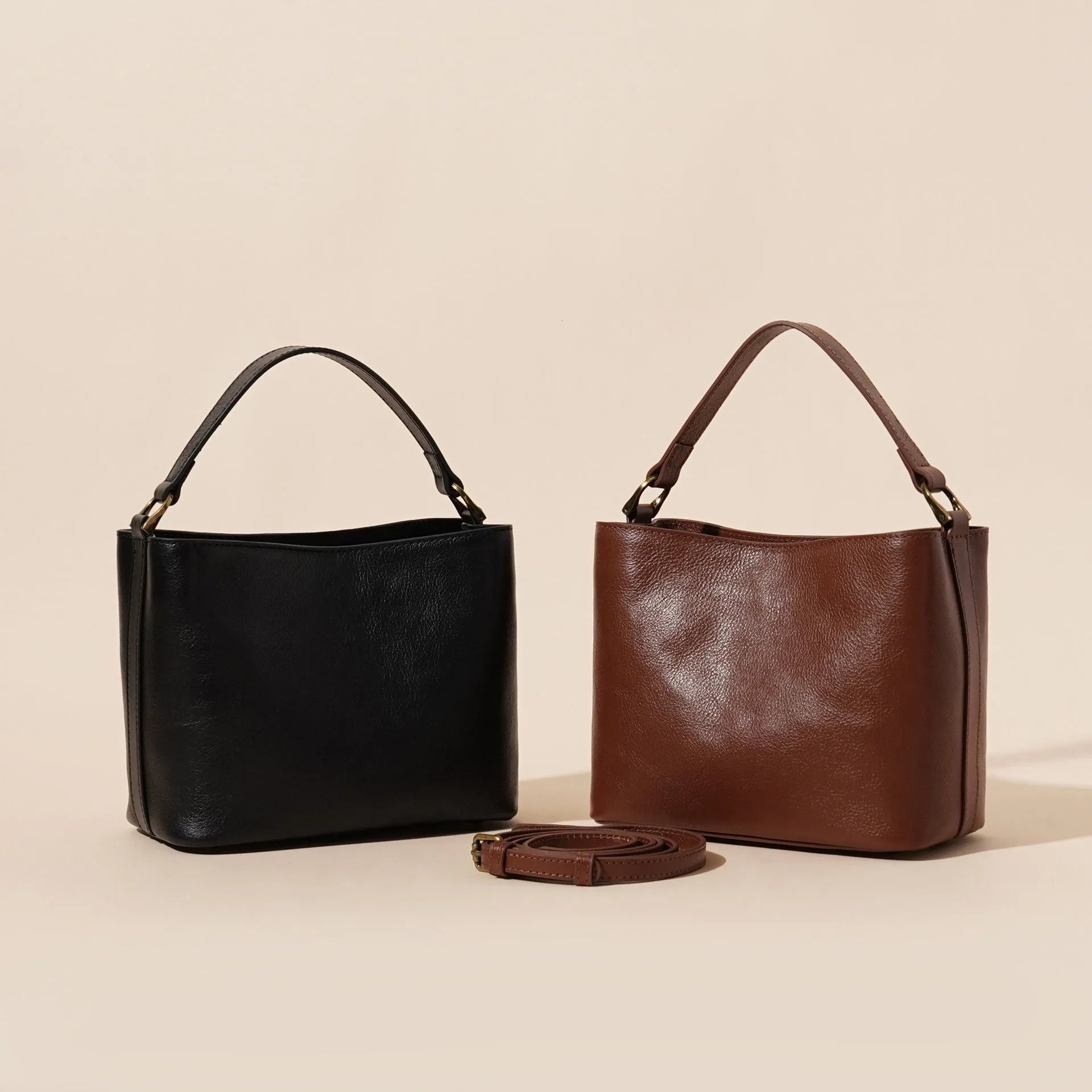 Sugar brown genuine cowhide leather women's vintage shoulder handbag showing square shape and single strap.