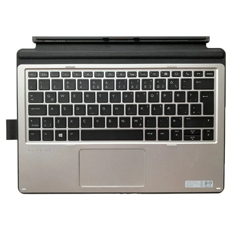 Official HP Elite X2 and Pro X2 tablet base keyboard with PS/2 connector on a desk.