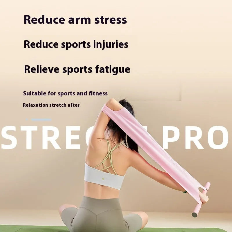 Grey and pink multi-function yoga stretching tool for shoulders, back and hips.
