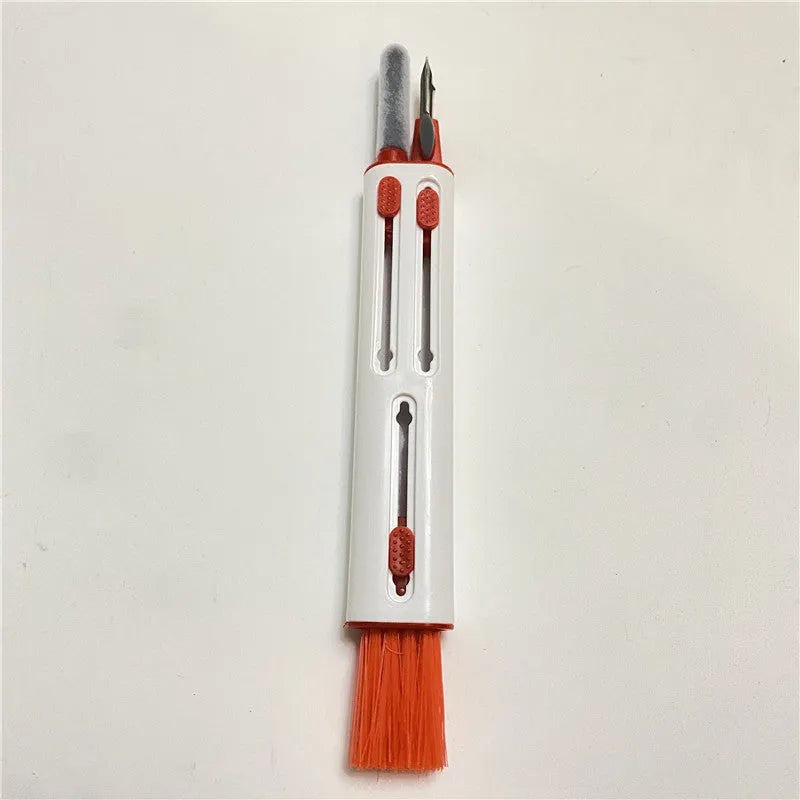 AirPods Pro cleaning kit with double-headed brush showing four cleaning attachments for electronics