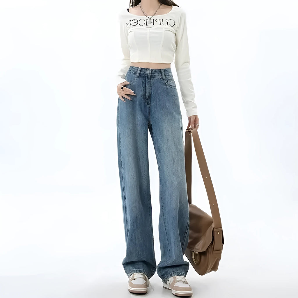 Women's retro blue high-waist wide leg jeans laid flat, showing the straight-leg trousers cut.