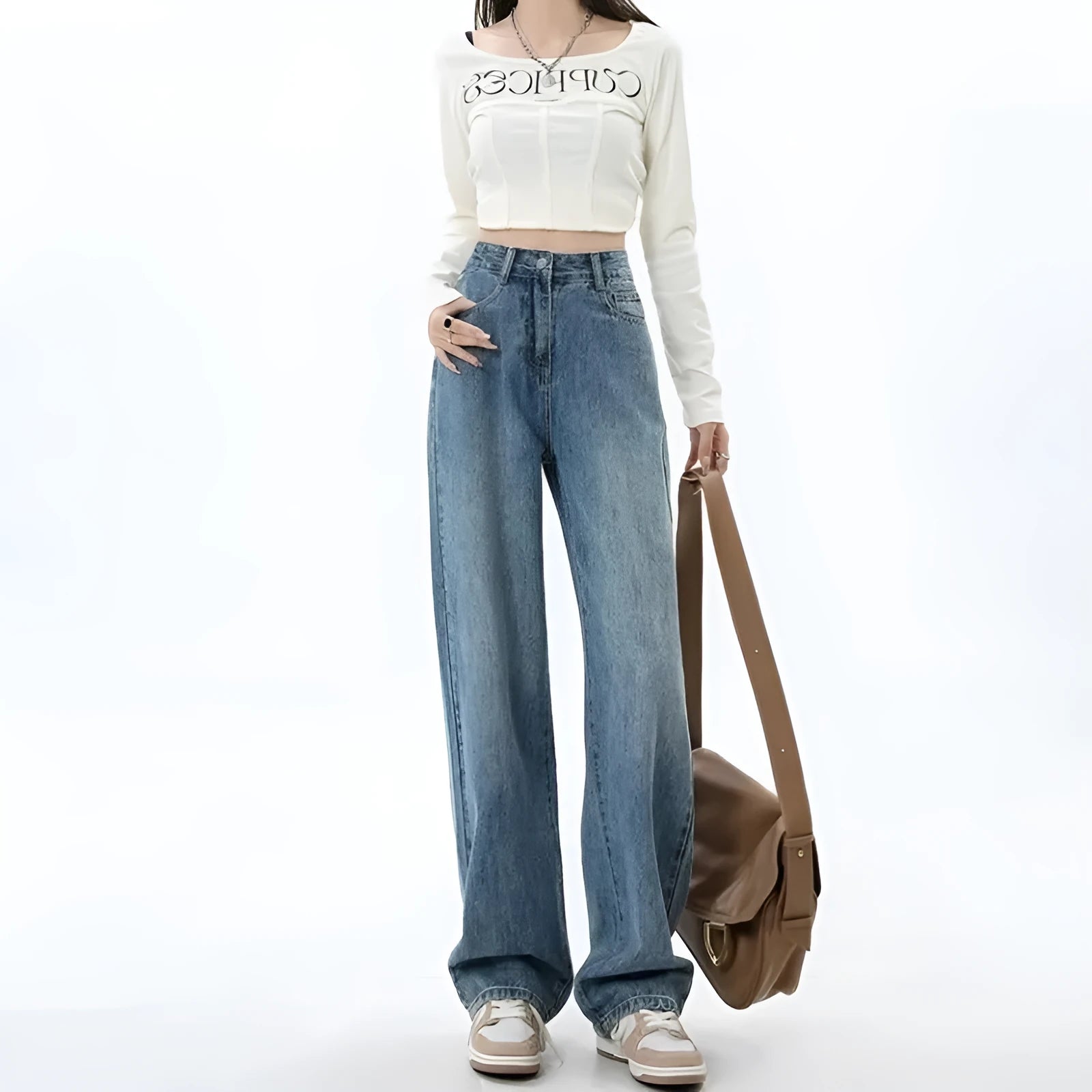 Women's retro blue high-waist wide leg jeans laid flat, showing the straight-leg trousers cut.