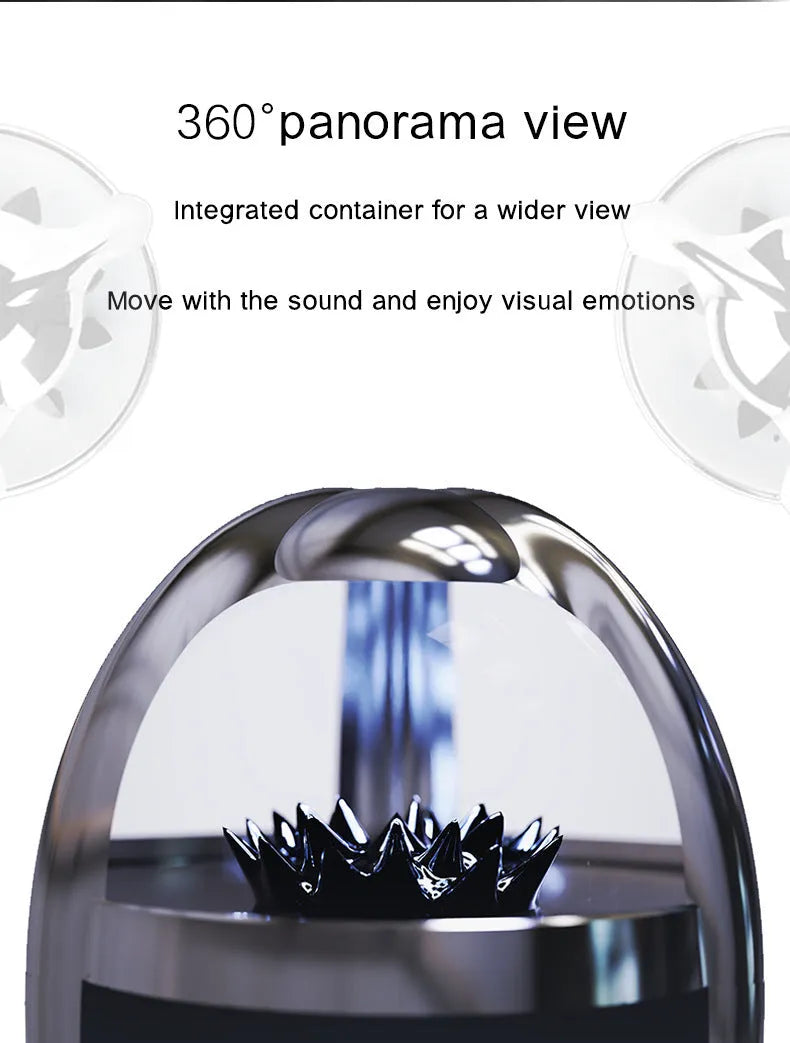 Magnetic fluid Bluetooth speaker in silver black with transparent glass and solid wood bracket