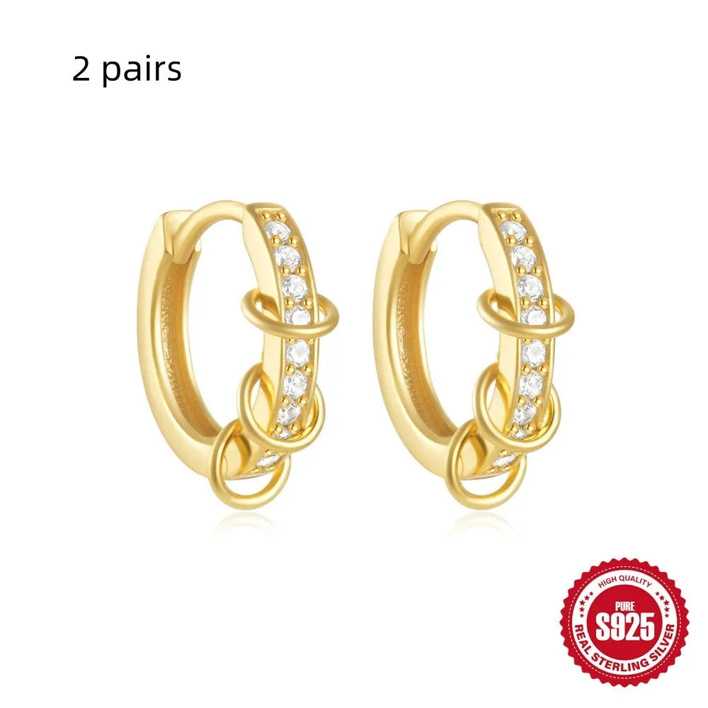 Small round geometric sterling silver stud earrings with diamond accents in gold or silver finish