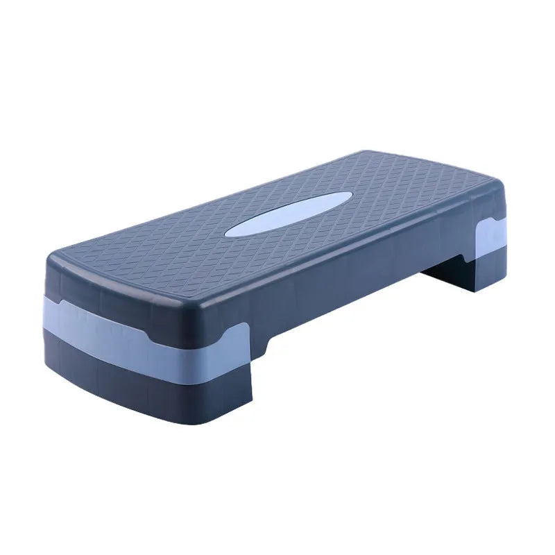 Grey Fit Step aerobic platform on a wood floor, showing its 68cm length and 15cm height.