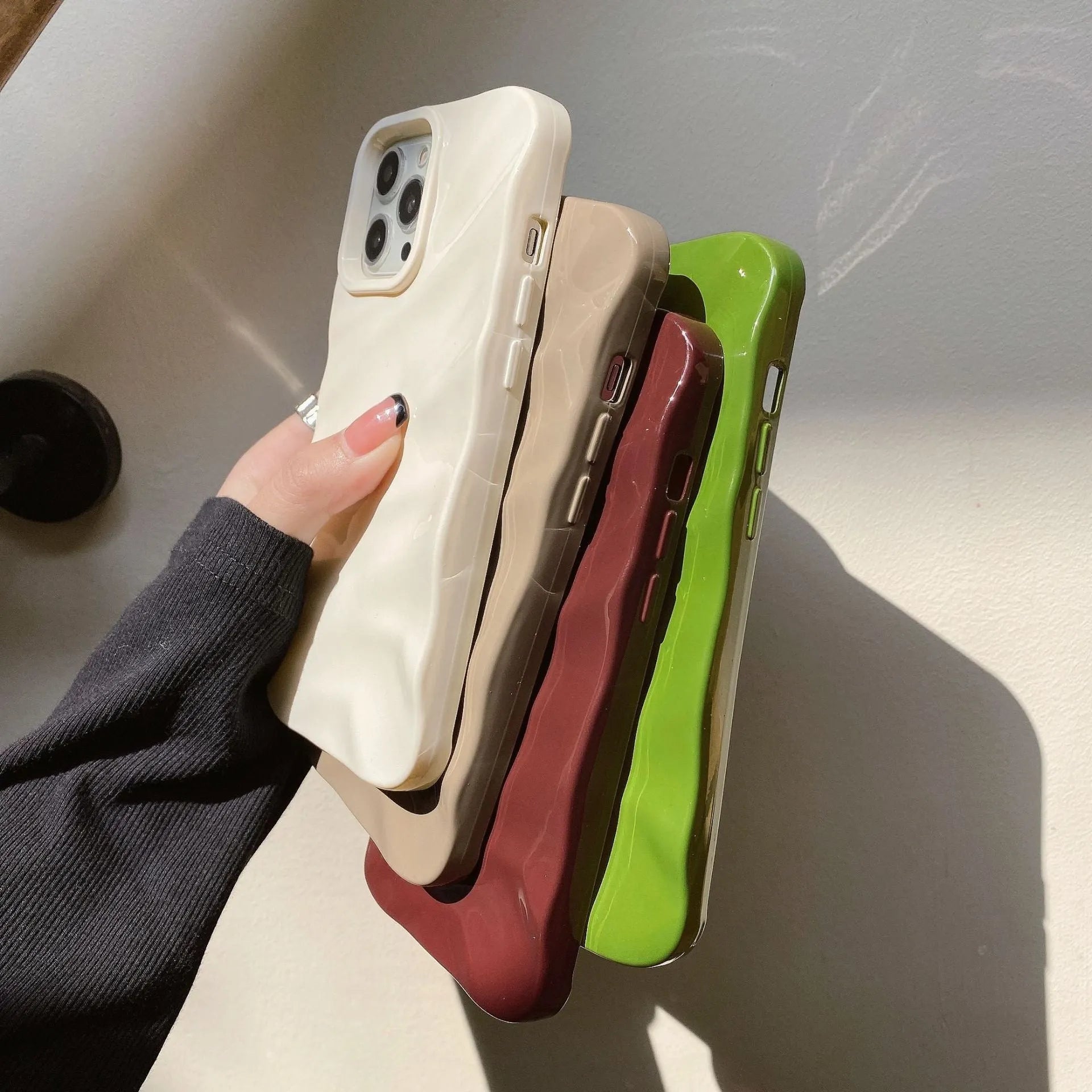 Soft wave-pattern TPU phone case for Apple iPhone 17 in Burgundy colour.