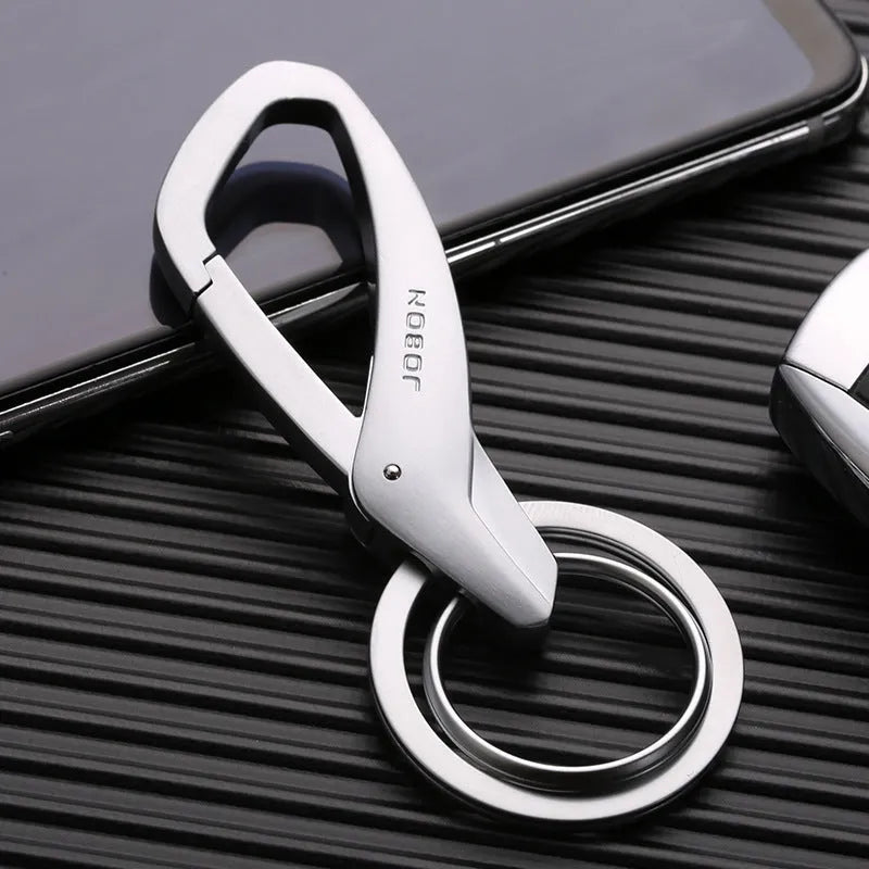 Black zinc alloy double ring car keychain attached to a belt loop.