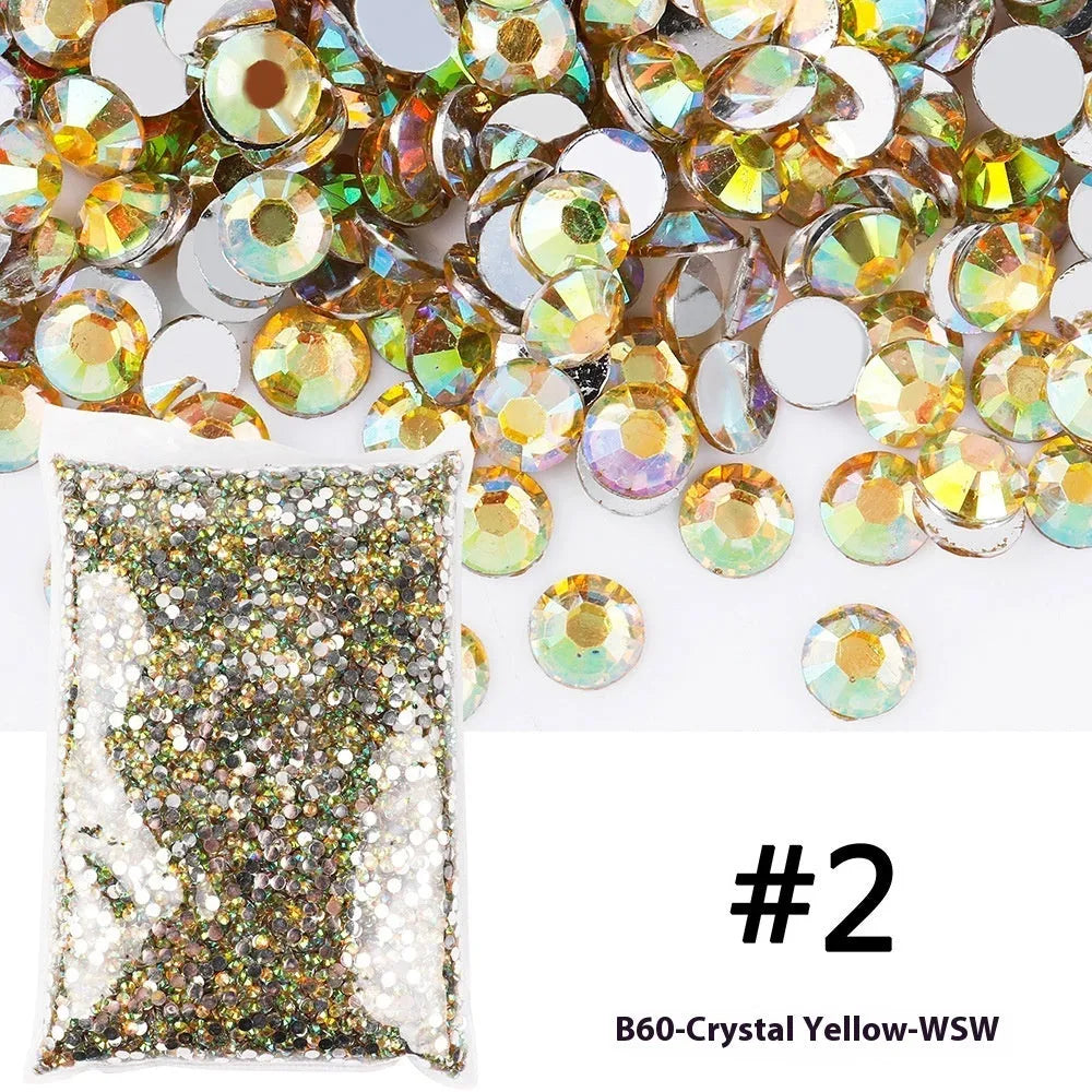 Plastic resin nail art rhinestones in multiple colours with electroplated surfaces arranged in mesh packaging