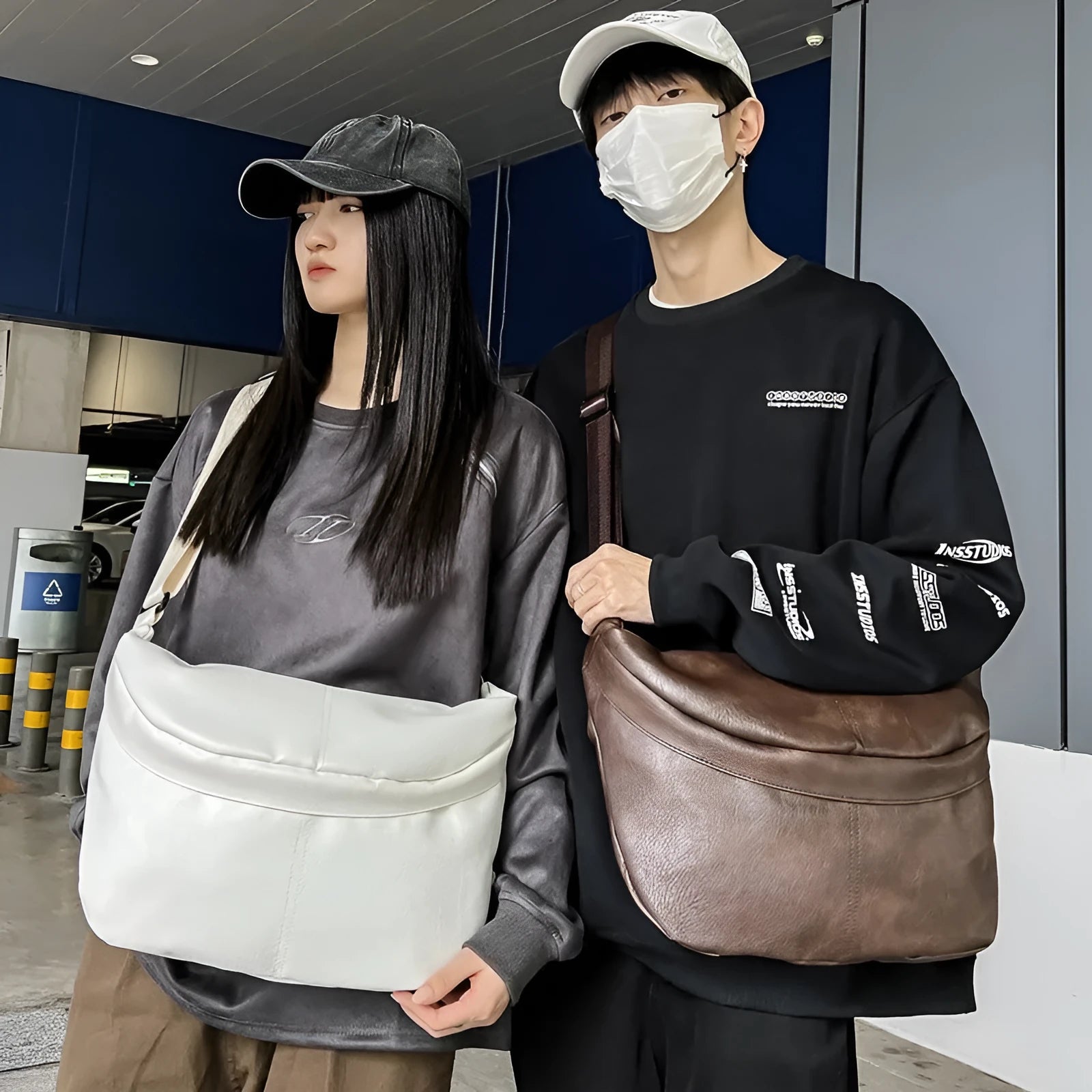 Men's brown retro crossbody bag showing 50cm width and PU leather construction