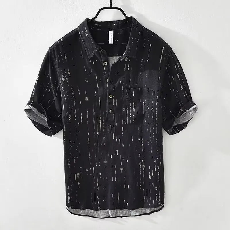 Men's black and white cardigan-style polo shirt with lapel collar and short sleeves