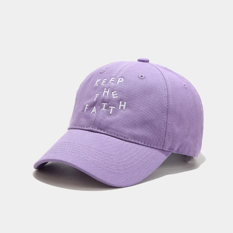 Men's beige cotton baseball cap with adjustable strap and dome crown on a white background.