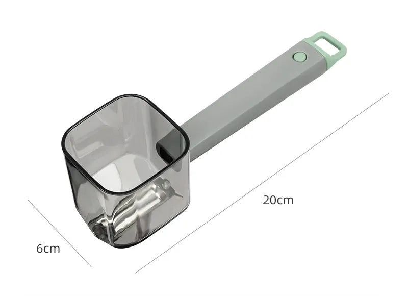Green, grey, and red stainless steel kitchen peelers with plastic handles on a white background.