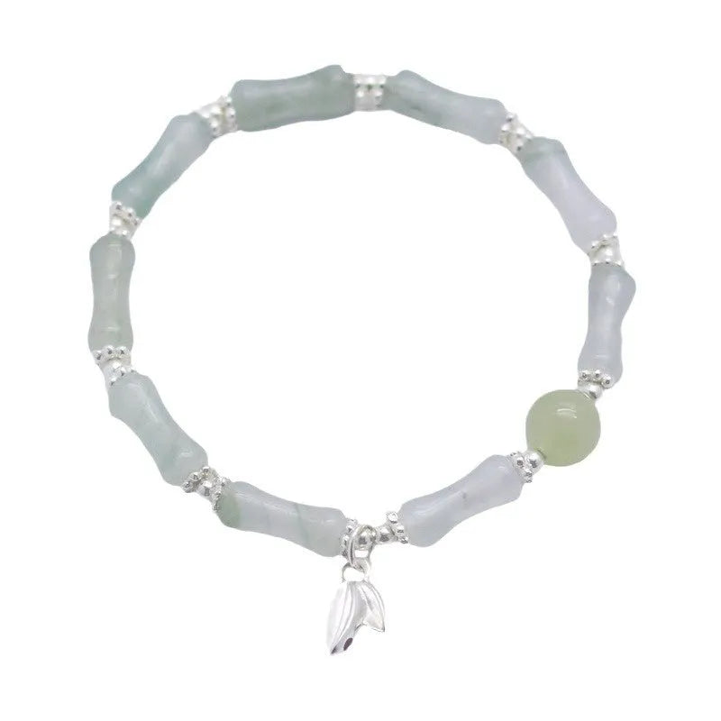 Natural Tianshan green bamboo and sterling silver antique-style bracelet for women with a bamboo joint motif.