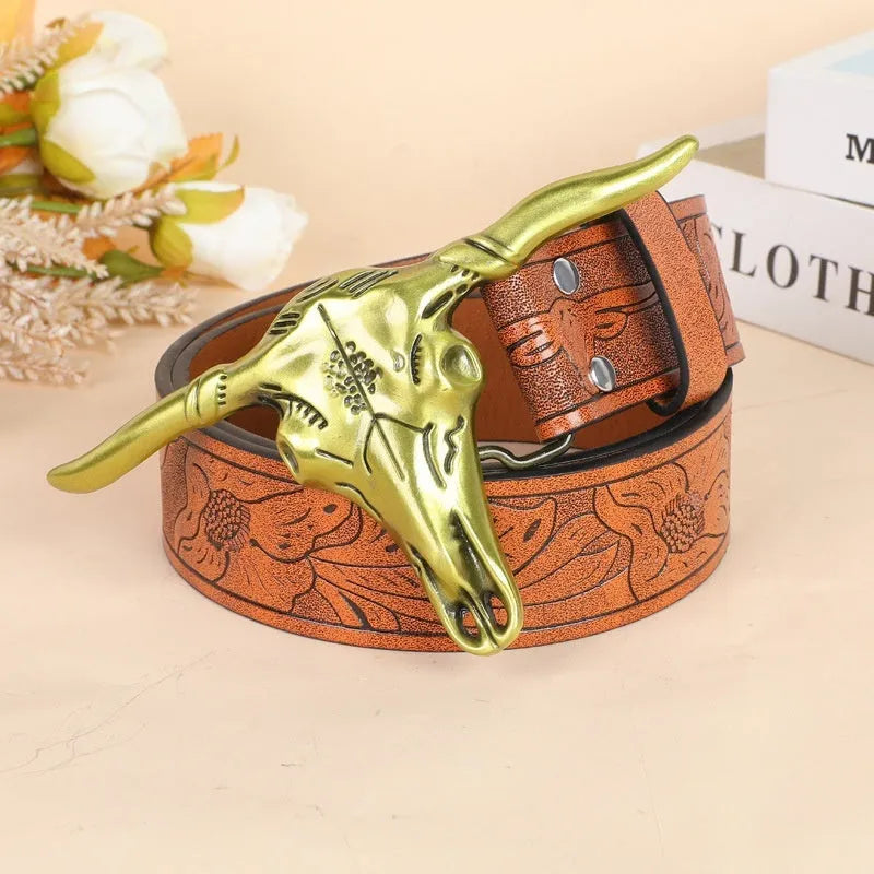 Men's belt with detailed cow head alloy buckle on imitation leather strap with pin buckle fastening