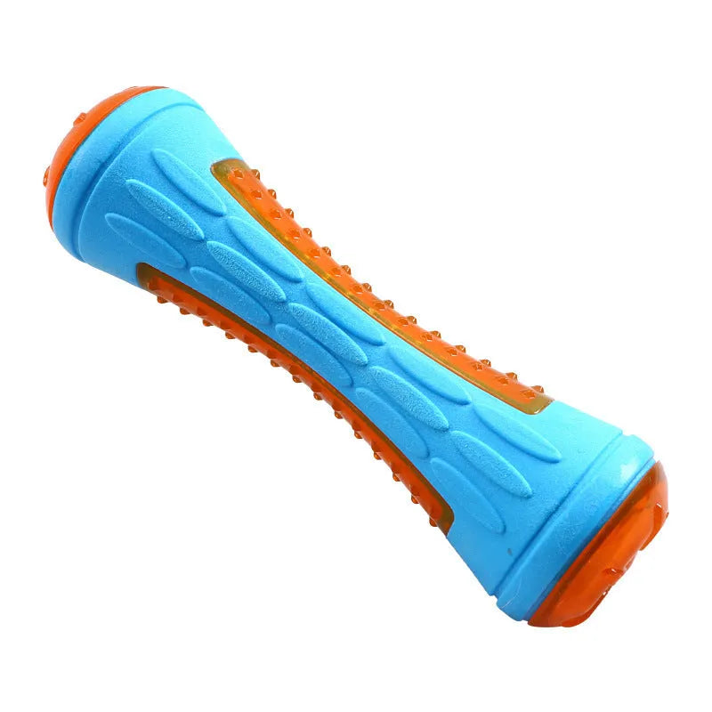 Three floating TPR dog toys: a squeaky ball, barbell, and tyres for water and land play.