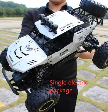 Large black 4WD remote control climbing car and smaller silver high-speed model with 2.4G remote.