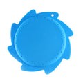 Silicone water toy in blue expression style on a wet surface for bath play