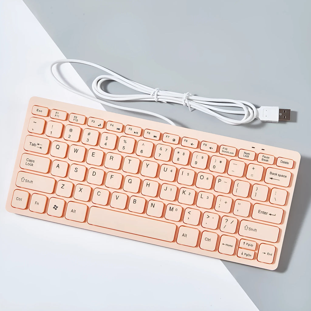 Mini USB wired keyboard for laptops in black, white, pink, or blue colours with 1.3 metre cable