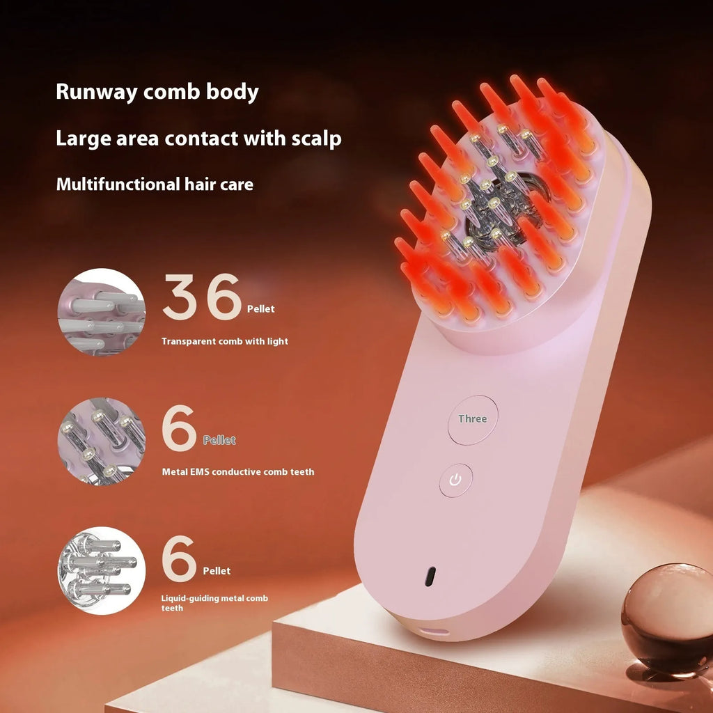 Pink and black smart massage comb with red light therapy for hair care, shown next to a ruler under 10cm.