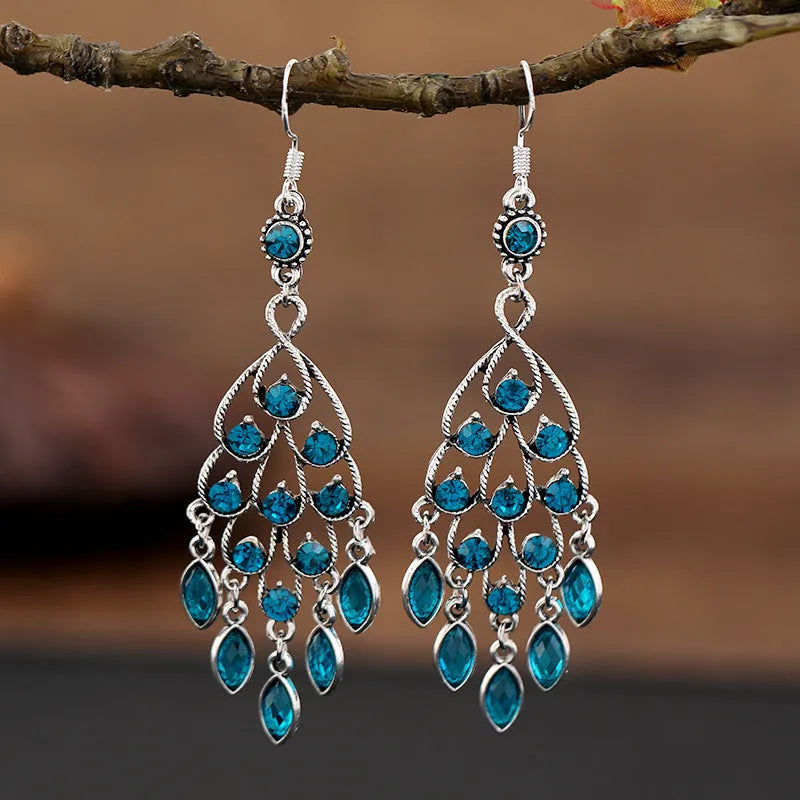 Retro long fringe drop earrings in Smart Water Drop Purple colour with alloy construction.