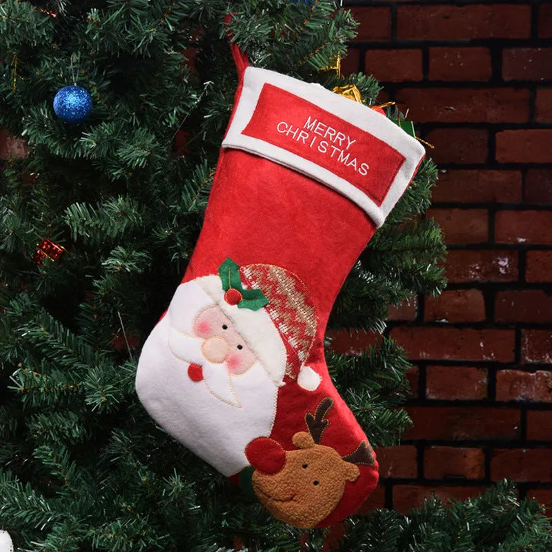 Red Christmas stocking with elk and snowman pattern, made from non-woven fabric with hanging loop.