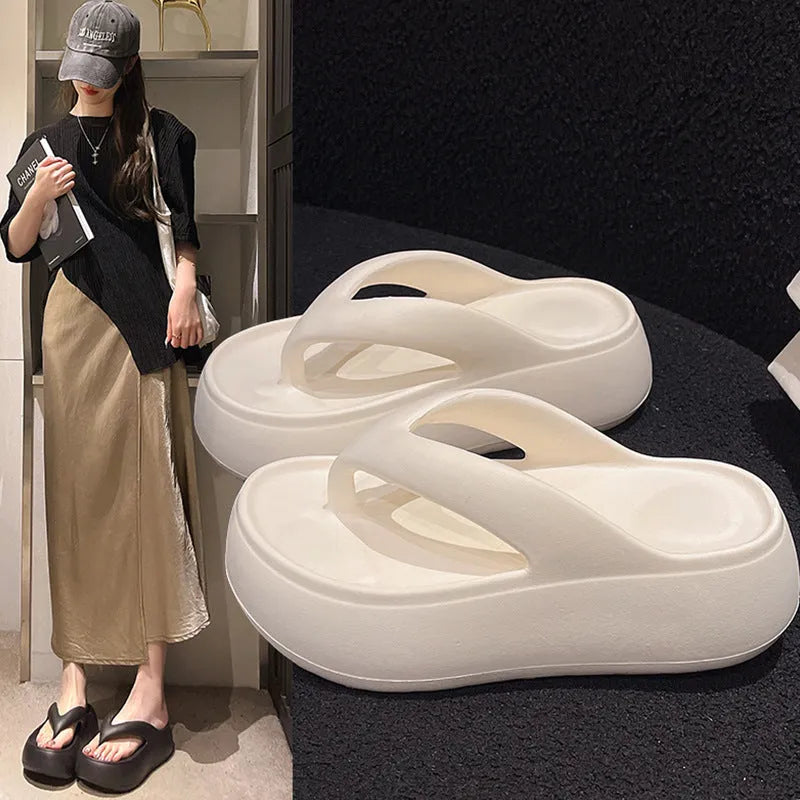 Women's thick-soled height increasing EVA flip-flops with herringbone strap in solid black