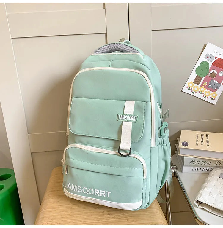 High school student backpack in waterproof nylon with curved shoulder straps and under 20L capacity
