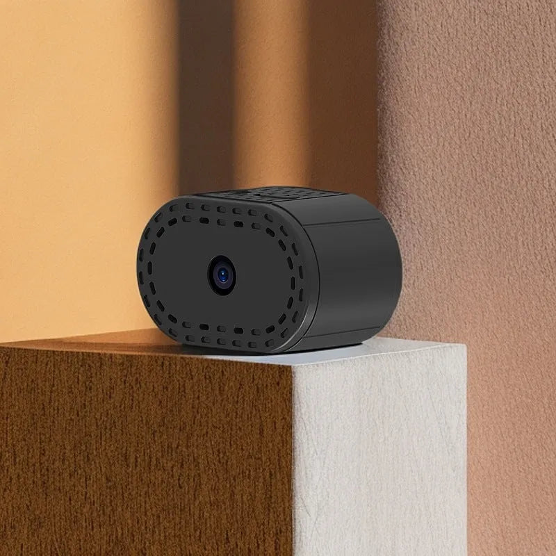 Smart camera wireless WiFi remote monitor black with bracket on shelf