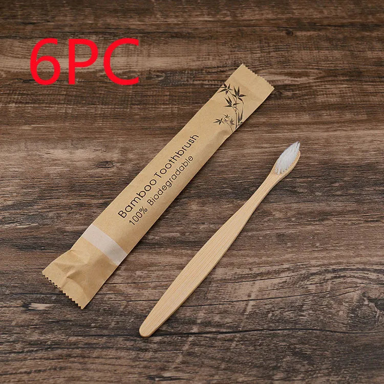 Set of 10 bamboo toothbrushes in multiple colours showing natural bamboo handles and soft bristles