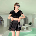 Women's solid colour two-piece skirt swimsuit in polyester and spandex fabric
