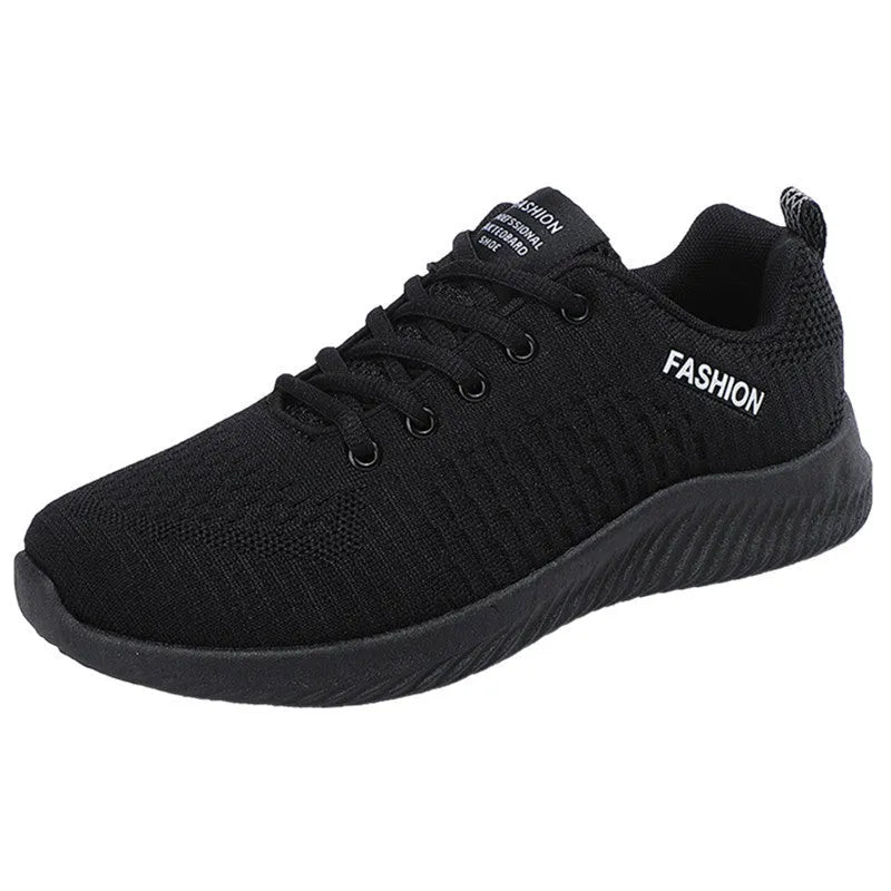 Men's lightweight breathable mesh casual sports shoes in black with white sole and lace-up closure