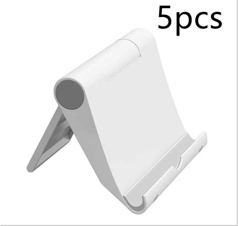 Black PE folding stand holding a smartphone at an angle on a wooden table.
