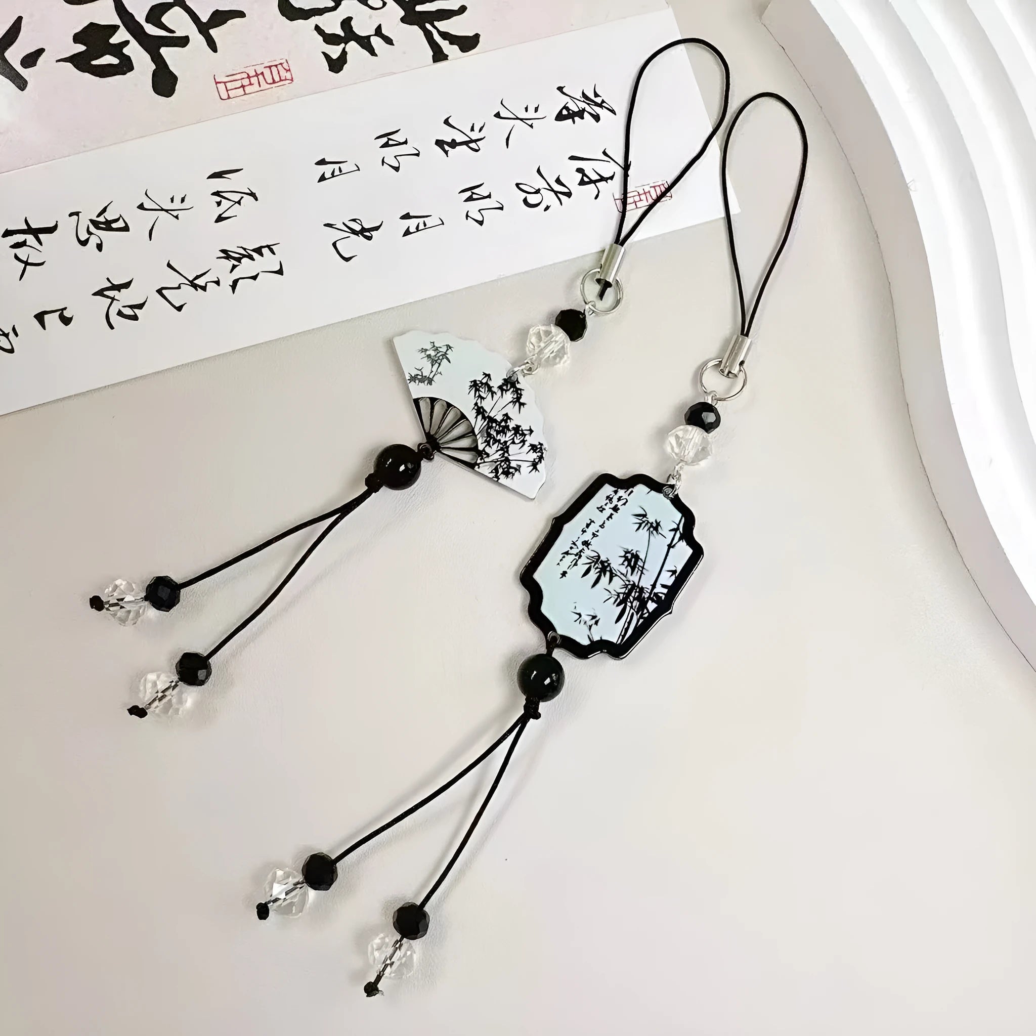 Guofeng style floral beaded keychain with baked varnish finish and metal ring.