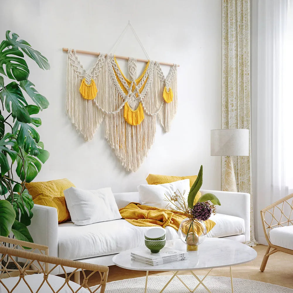 Hand-woven creamy-white cotton Nordic tapestry with yellow accents, 120cm by 95cm rectangular wall hanging.