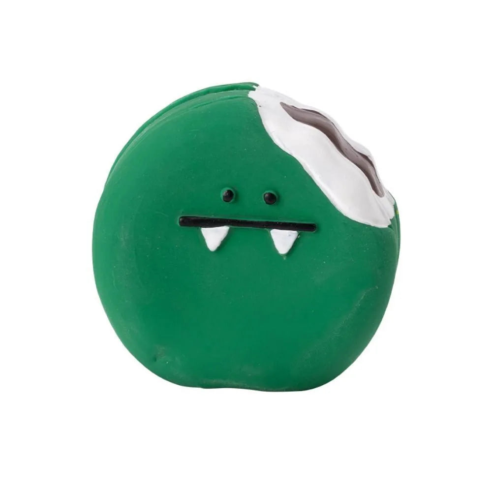 Green and yellow egg-shaped latex dog toy with cartoon bread pattern and squeaker