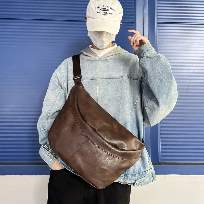 Men's brown retro crossbody bag showing 50cm width and PU leather construction