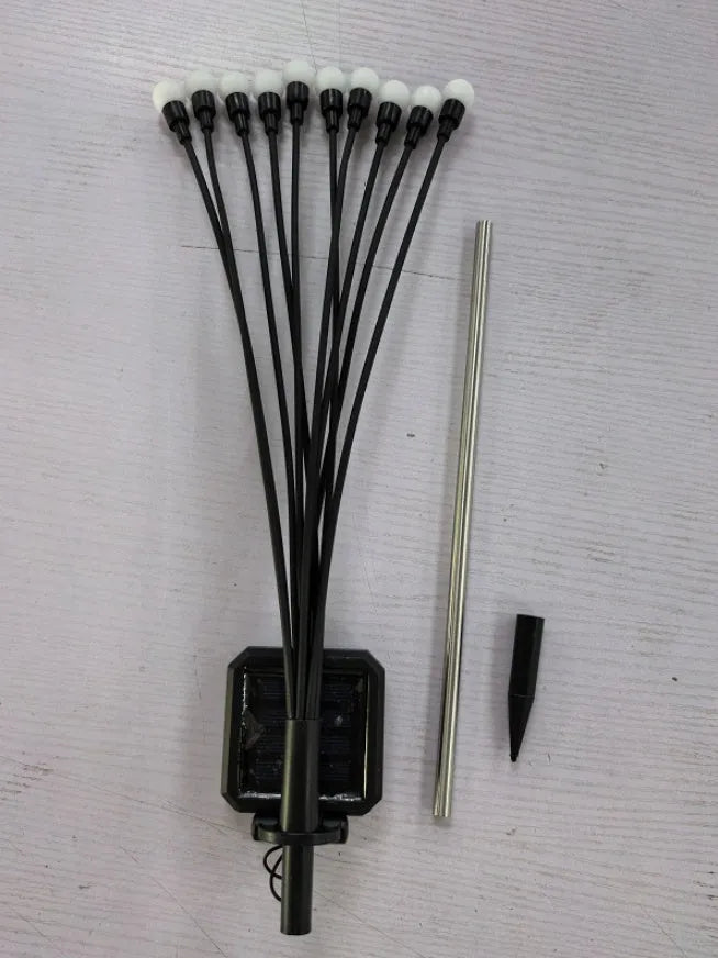 Solar-powered LED garden light with ground spike for soil installation in warm white or coloured lighting options